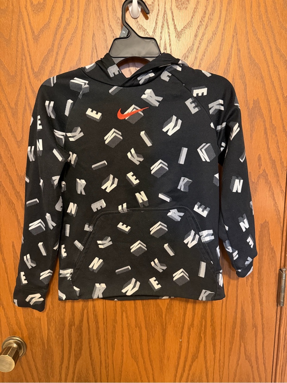 Boys Nike Black Hoodie with White Letter Print and Red Swoosh
